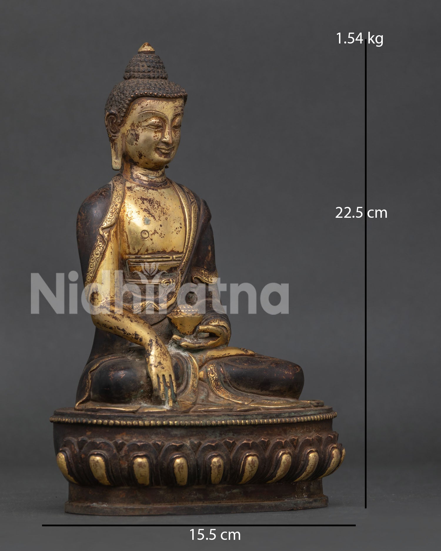 Shakyamuni Buddha statue seated on lotus pedestal in Bhumisparsha Mudra.