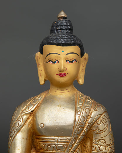 Shakyamuni Buddha Statue showing gold painted face and Himalayan craftsmanship.