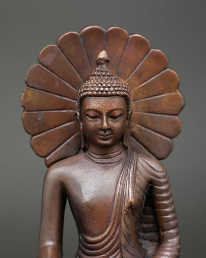 Shakyamuni Buddha Statue showing serene face intricate robe details and traditional Himalayan craftsmanship.