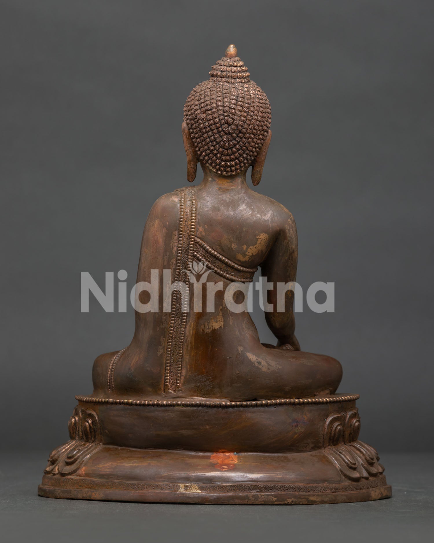 Shakyamuni Buddha statue showing traditional Newari copper craftsmanship.