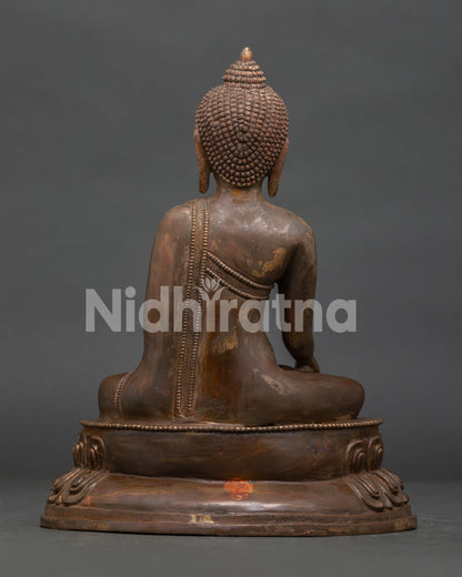 Shakyamuni Buddha statue showing traditional Newari copper craftsmanship.