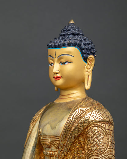 Shakyamuni Buddha statue side close up monastic robe details.