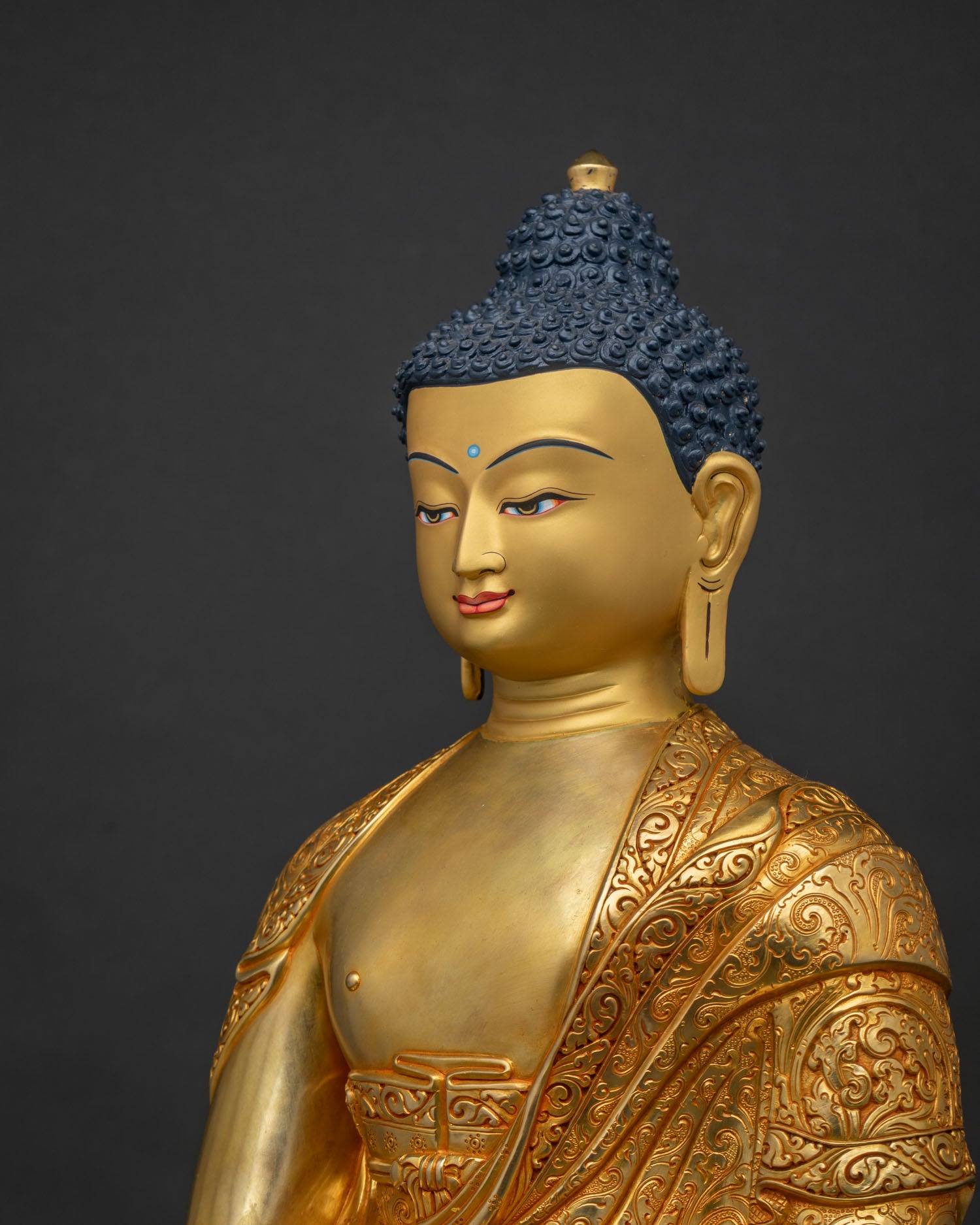 Shakyamuni Buddha Statue Side Close Up with Intricate Robe and Lotus Details