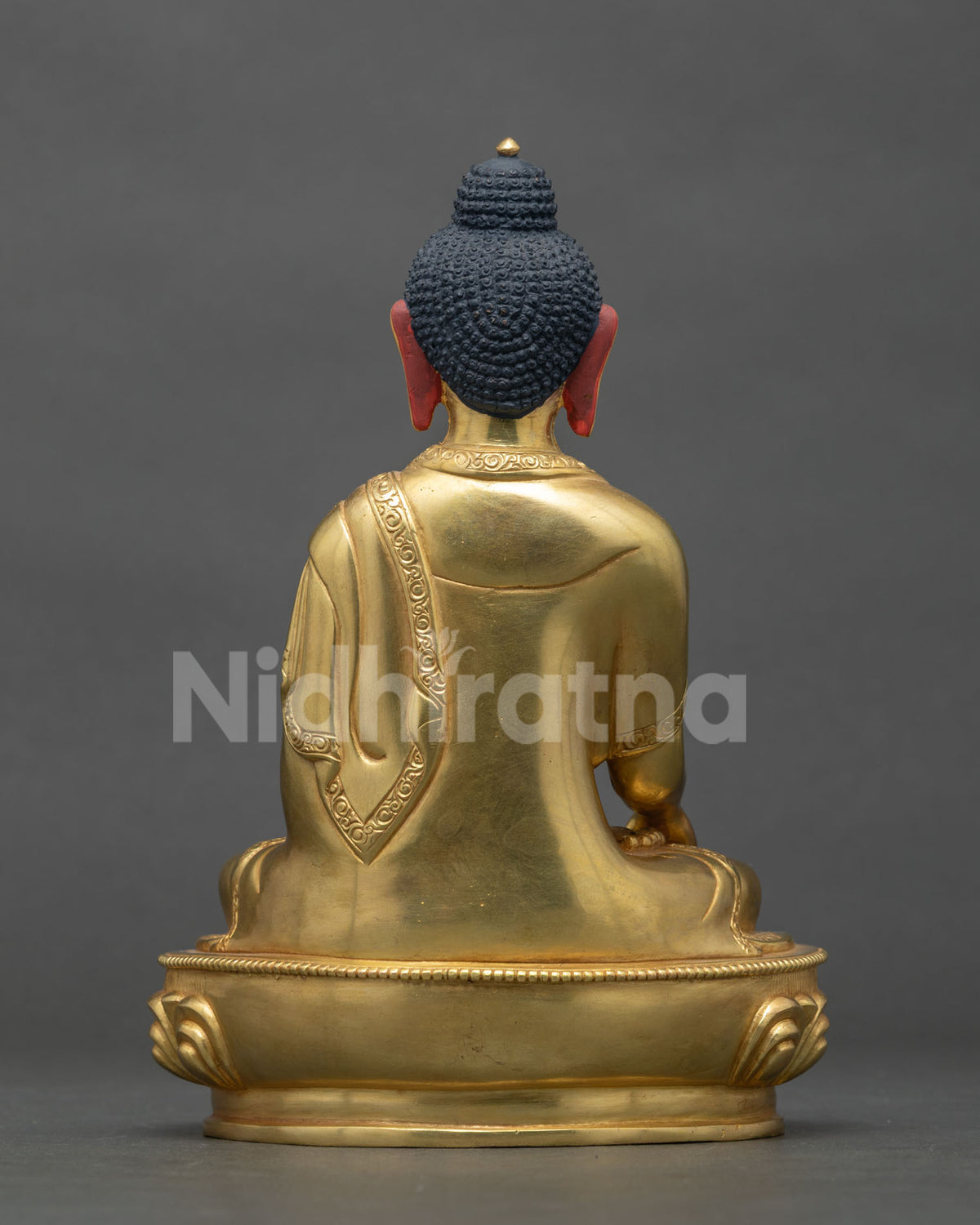 Shakyamuni Buddha statue traditional Newari craftsmanship gold gilded finish.