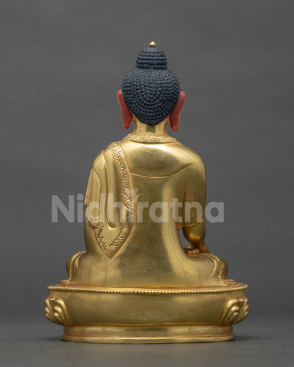 Shakyamuni Buddha statue traditional Newari craftsmanship gold gilded finish.
