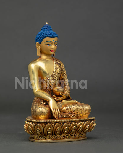 Shakyamuni buddha statue with 24k gold painted face.