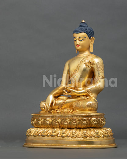 Shakyamuni Buddha statue with Bhumisparsha mudra and alms bowl left side view.