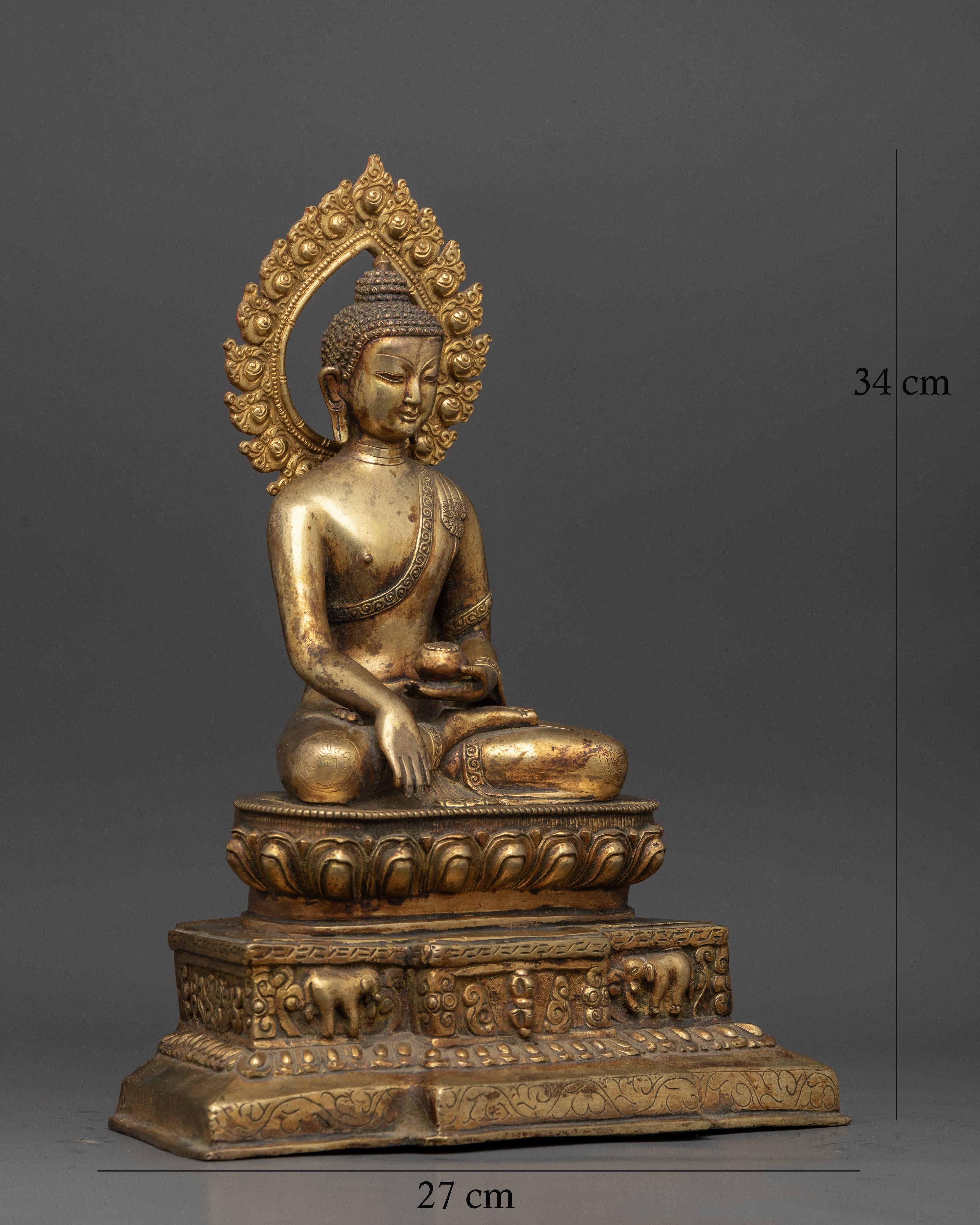 Shakyamuni Buddha statue with elephant vajra throne and lotus pedestal.