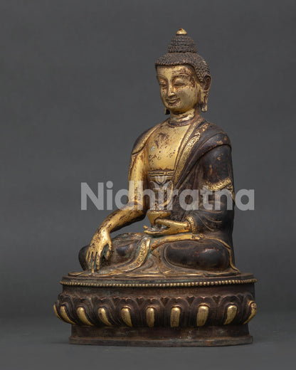 Shakyamuni Buddha statue with hand carved monk robe and begging bowl.