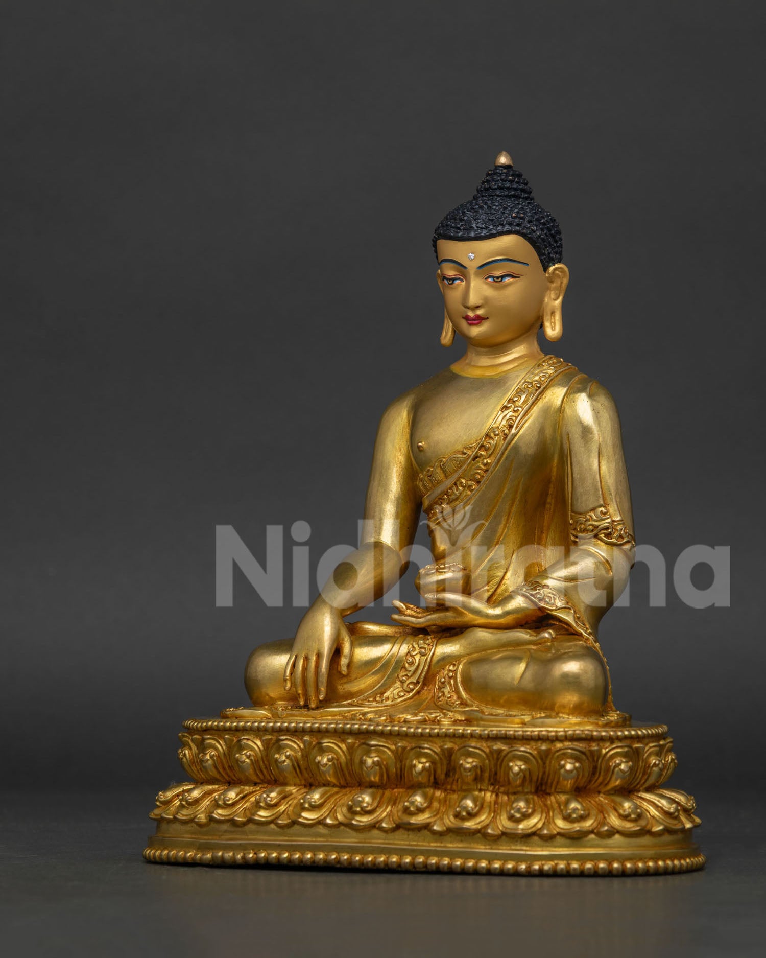 Shakyamuni Buddha statue with hand carved monk robe and lotus pedestal.