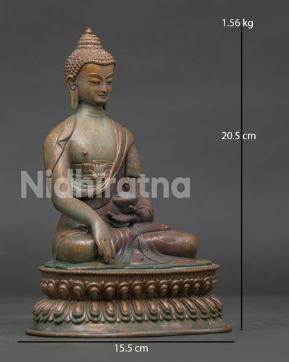Shakyamuni Buddha statue with oxidized copper finish and double lotus pedestal.