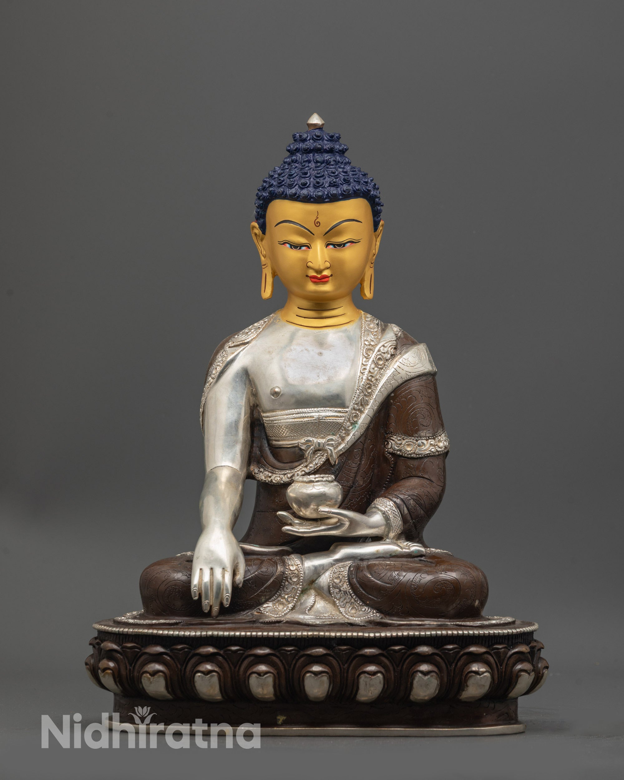 shakyamuni buddha statue front view gold gilded face oxidized copper body silver robe