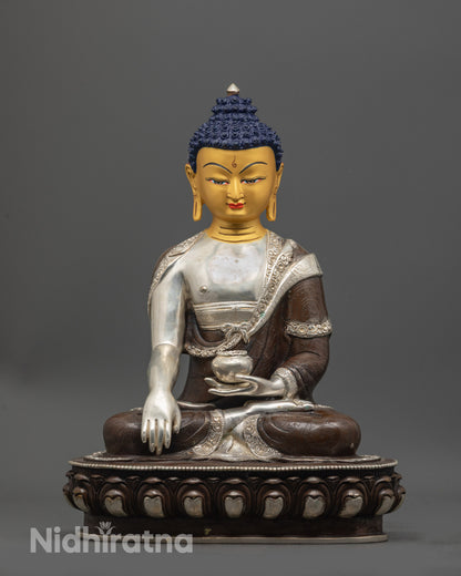 shakyamuni buddha statue front view gold gilded face oxidized copper body silver robe