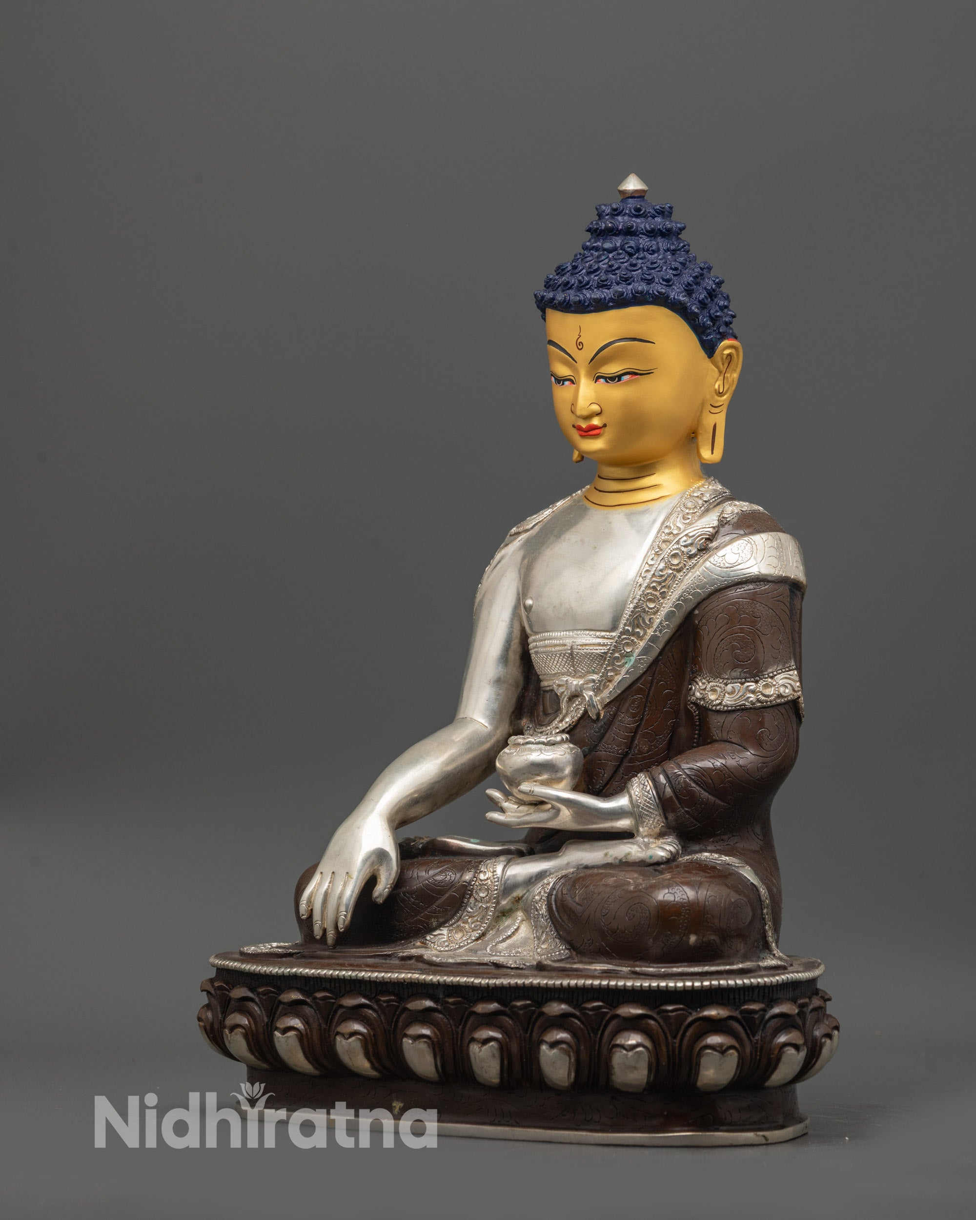 shakyamuni buddha statue side view oxidized copper body silver plated robe earthy hue finish