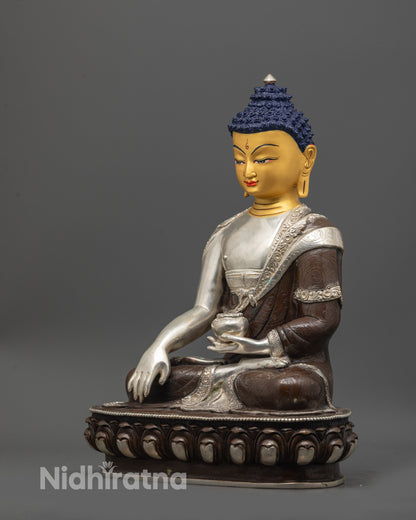 shakyamuni buddha statue side view oxidized copper body silver plated robe earthy hue finish