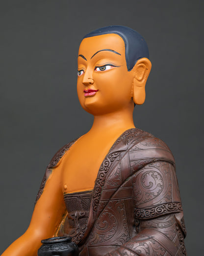 Shariputra statue side close up, oxidized copper robe detailing