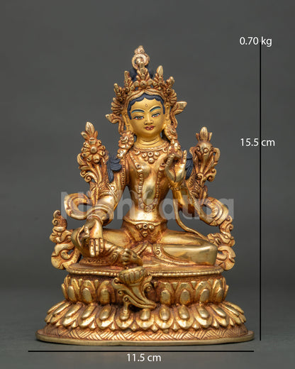 Shop front view of 24K gold Green Tara statue seated on lotus throne, handmade in Nepal