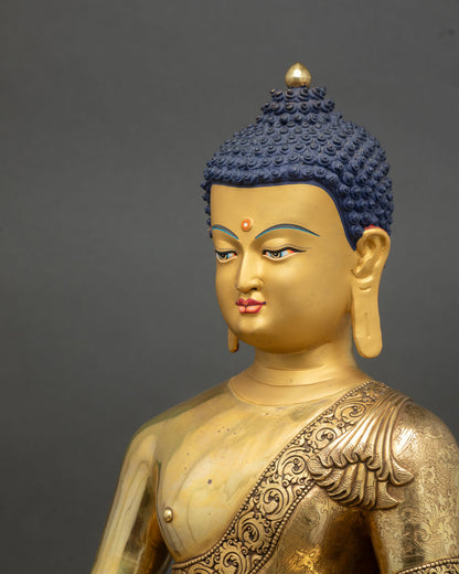 Side close up Amitabha Buddha statue ornate halo floral engraving copper gold finish