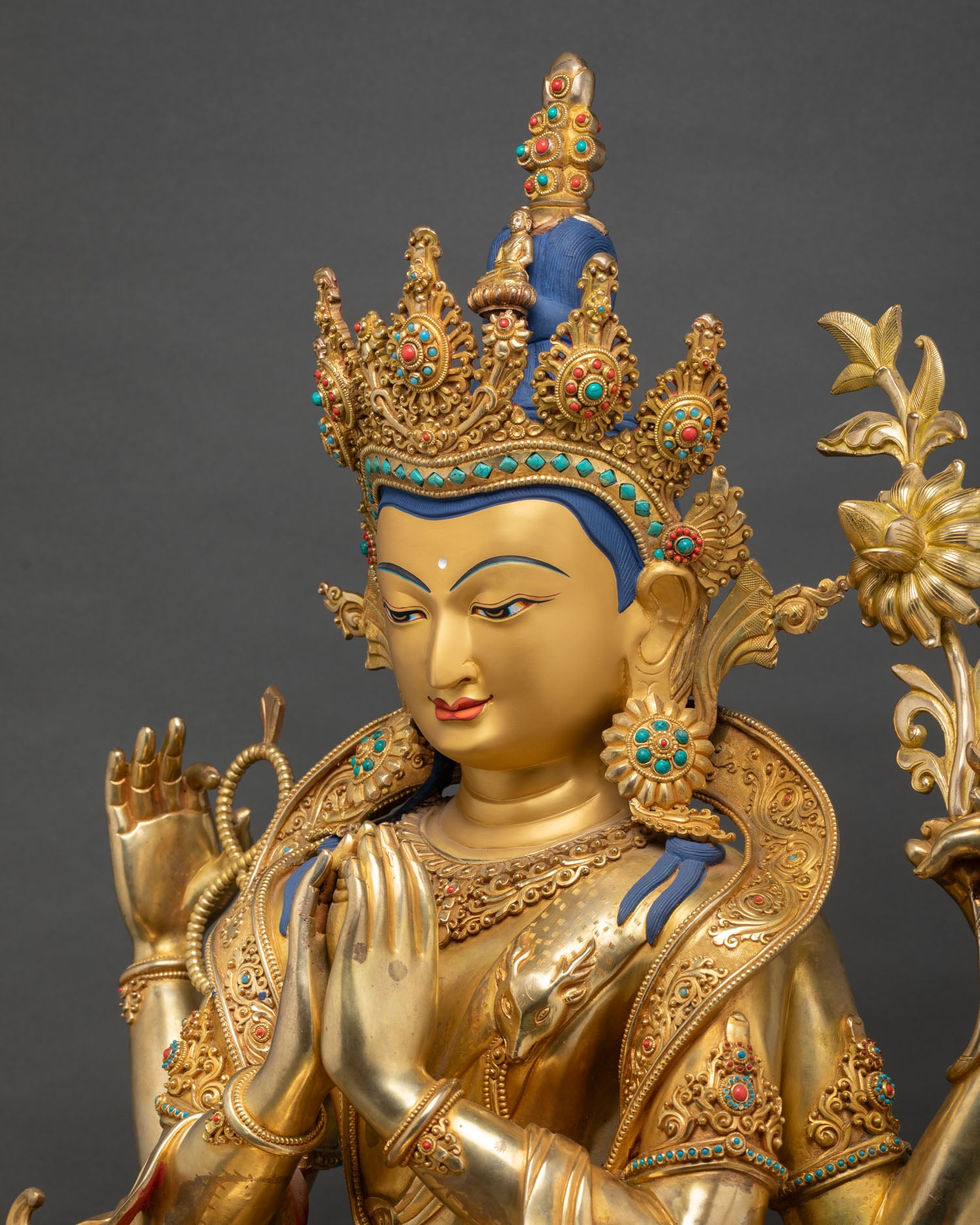 side close up chenrezig statue intricate jewelry carving copper lost wax nepal artwork