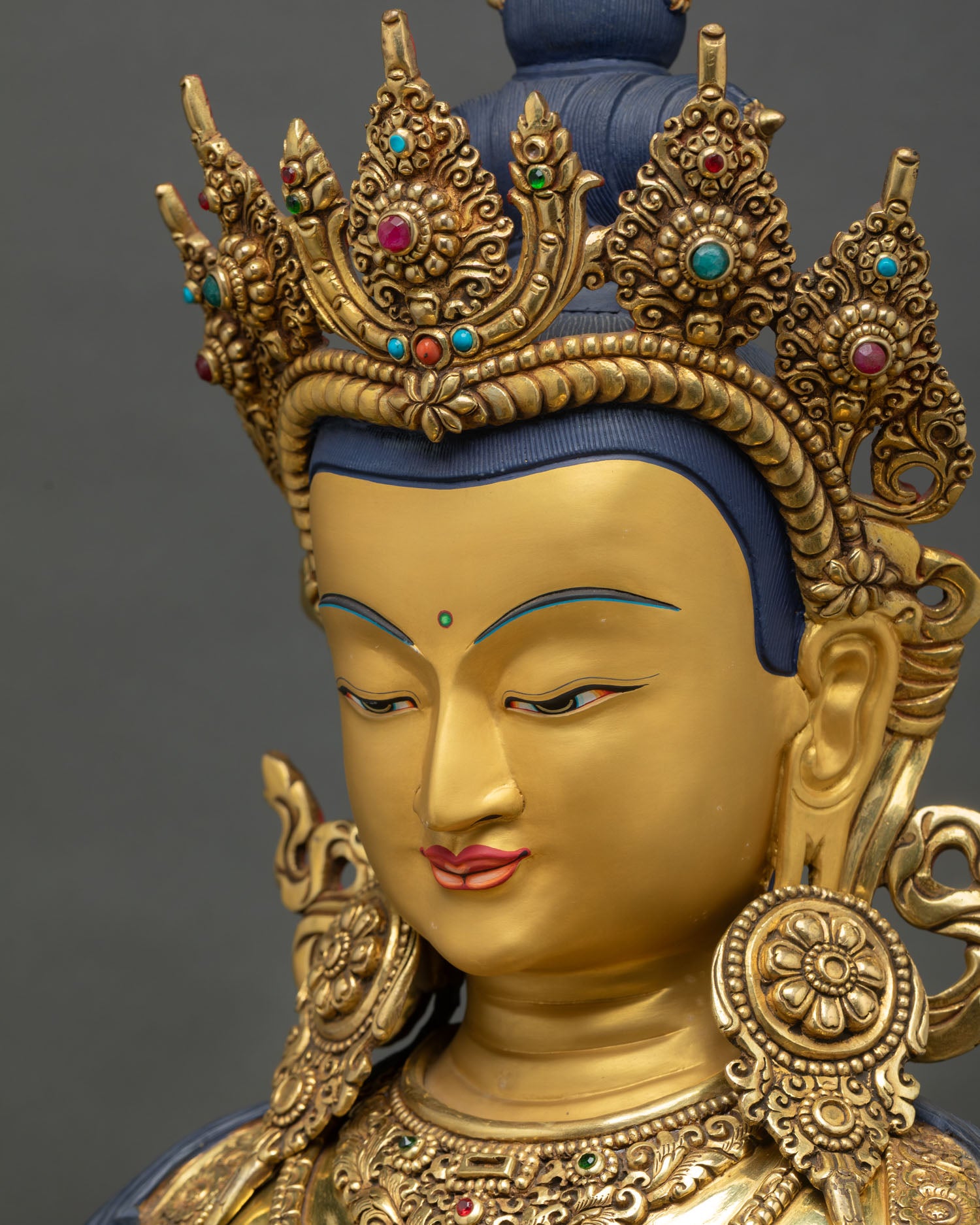 side close up of amitayus statue, intricate carvings, layered ornaments and lotus base craftsmanship