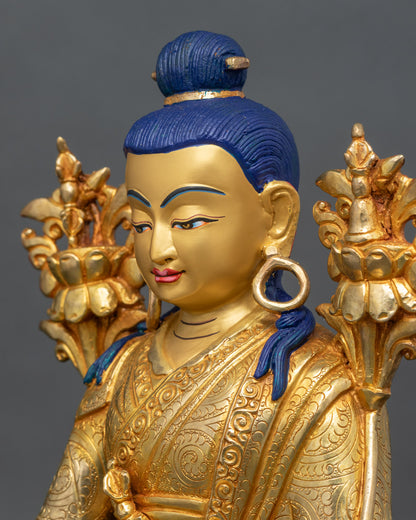 Side close-up of Jigme Lingpa statue, ornate lotus seat with hand-engraved robes