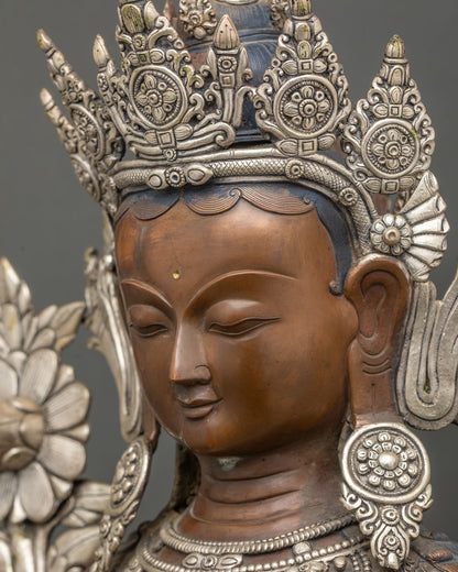 Side close up of Green Tara Statue face showcasing peaceful expression and artisan craftsmanship