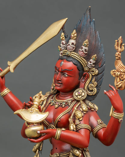 Side close-up of Maha Vajravarahi statue highlighting bone ornaments and gold lotus pedestal carving