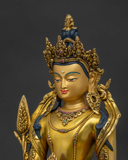Side close-up of Nepalese Ksitigarbha copper statue showing lotus base details