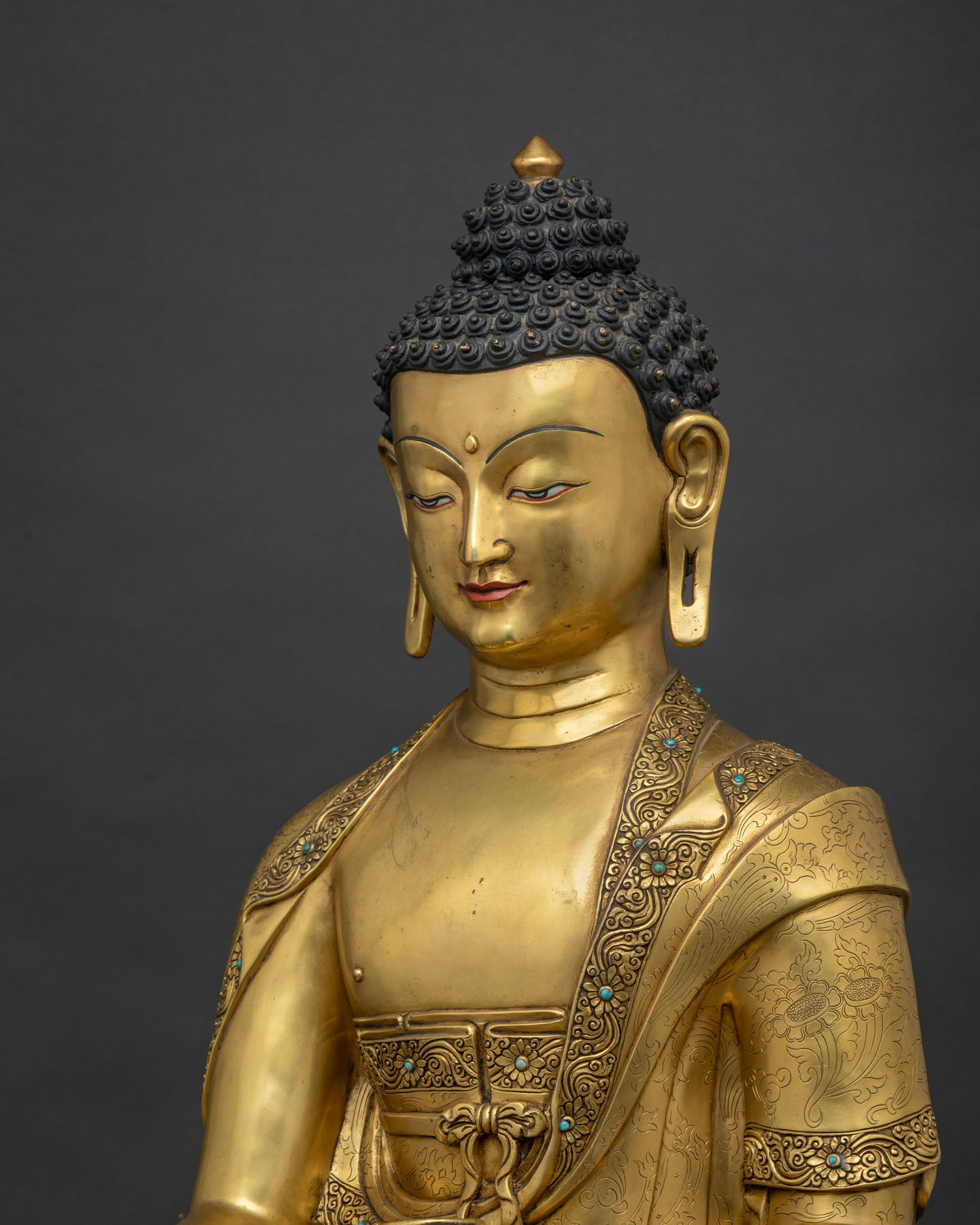 Side close up of Shakyamuni Buddha Statue robe with hand-carved motifs