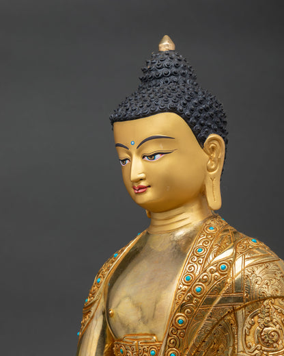 side close up shakyamuni buddha statue, engraved robe details, turquoise inlay copper gold