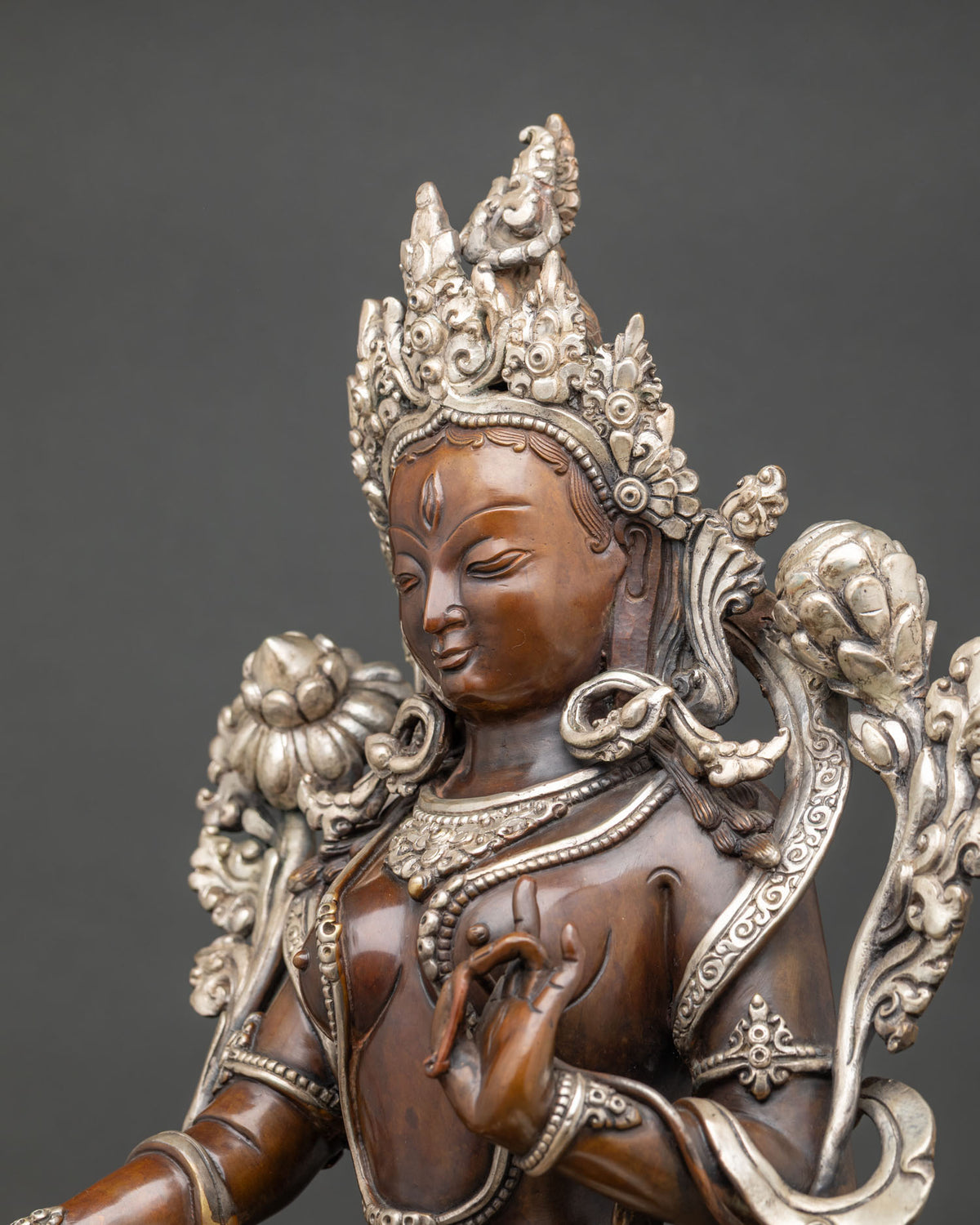 Side detail handcrafted White Tara goddess with lotus pedestal and sacred ornaments