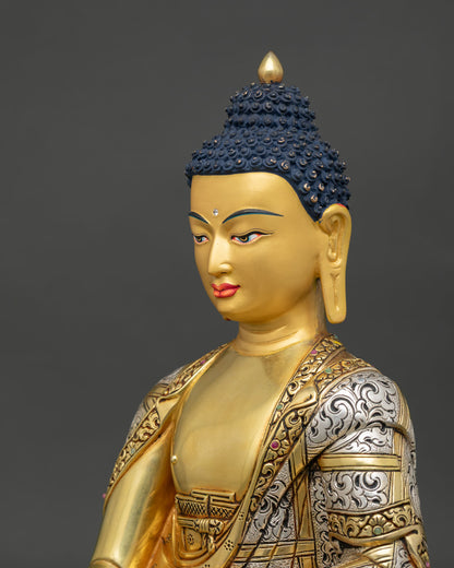 Side detail of Shakyamuni Buddha statue showing ornate monk robe patterns