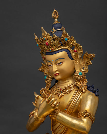 Side detail of Vajradhara statue showing hand-chased crown and jeweled earring craftsmanship