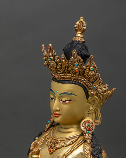 Side detail of Vajrasattva statue on lotus pedestal with intricate gilding