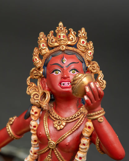 Side detail Vajrayogini statue showing curved knife, skull cup, gold gilded copper and ritual ornaments