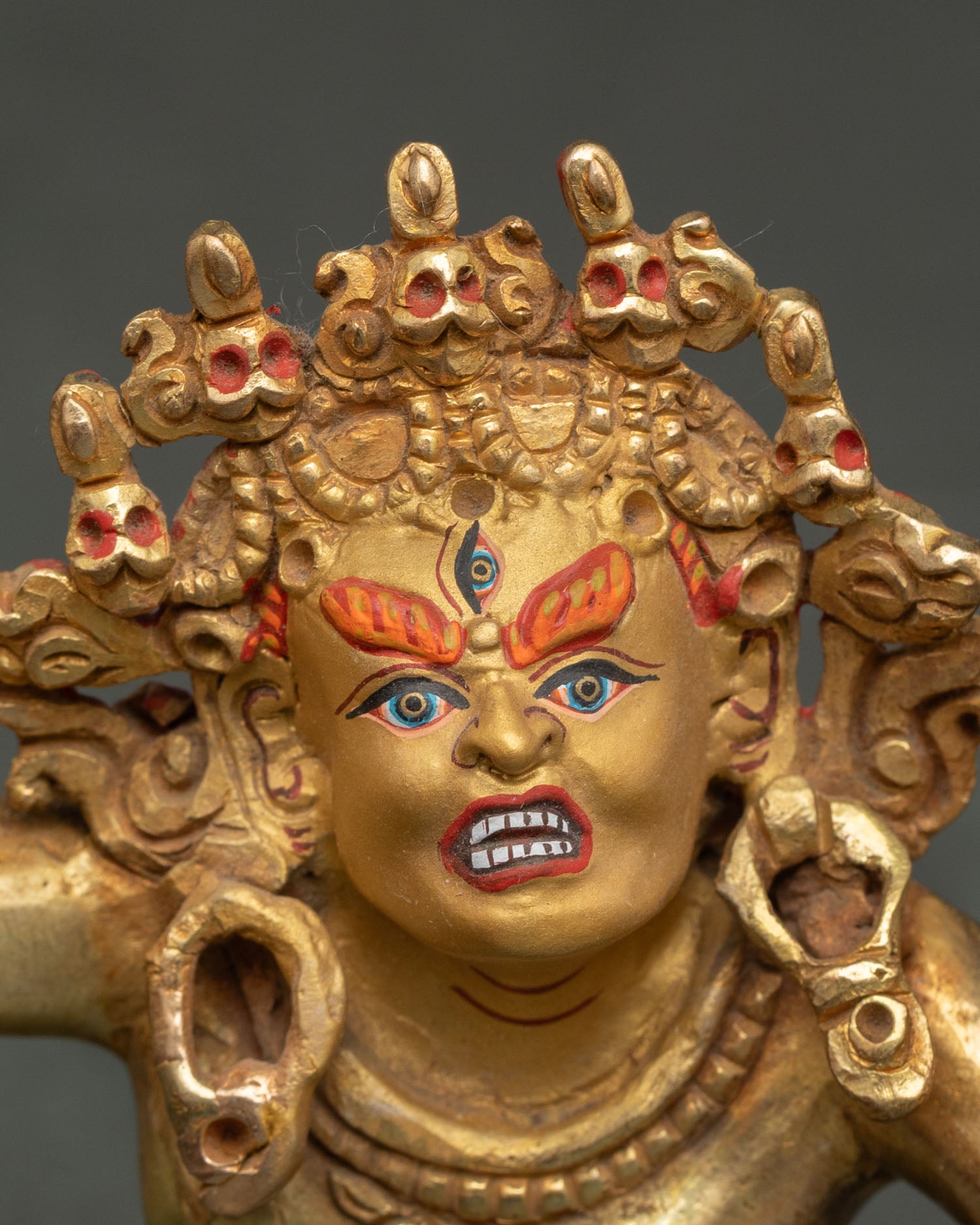 side face close up of kalachakra deity showcasing fine handcrafted features