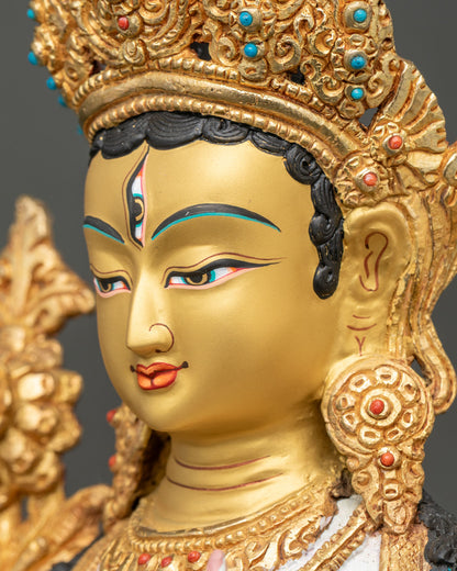 side face close-up of white tara bodhisattva, intricate gold-gilded crown and ornaments