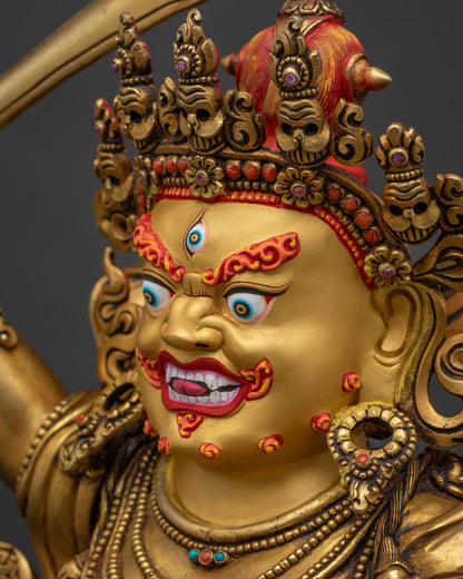 Side profile close-up of Black Manjushri's gold-painted face and wrathful expression