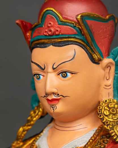 Side profile close up of Guru Rinpoche statue face, Padmasambhava with fine hand-painted details