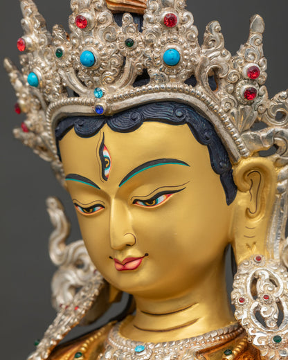 Side profile close up of White Parasol Goddess face with serene gold-painted features, Dukar Statue