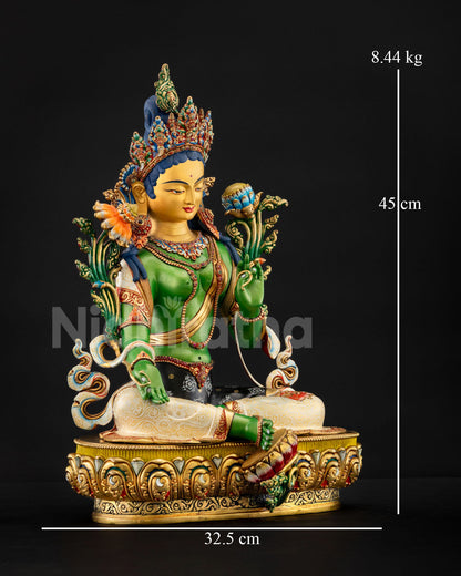 Side profile of Green Tara showing extended foot on lotus symbolizing readiness for compassionate action