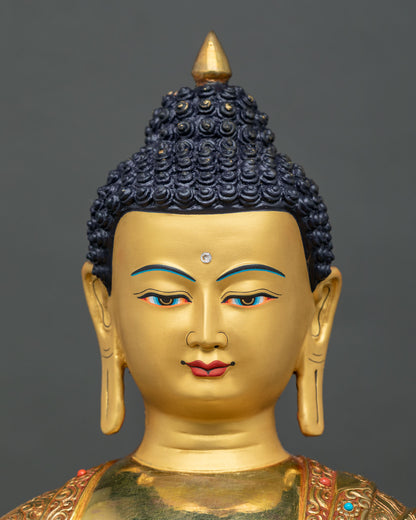 Side profile of Shakyamuni Buddha face highlighting 24K gold fire-gilding and peaceful look.