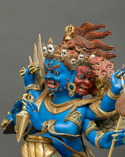 Side profile of Vajrakilaya three faces with skull crown, flaming red hair, vajra finial and gem inlay