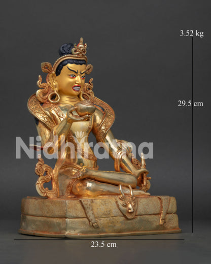 tilopa statue right side view seated mahāsiddha deer skin pedestal copper gold nepal
