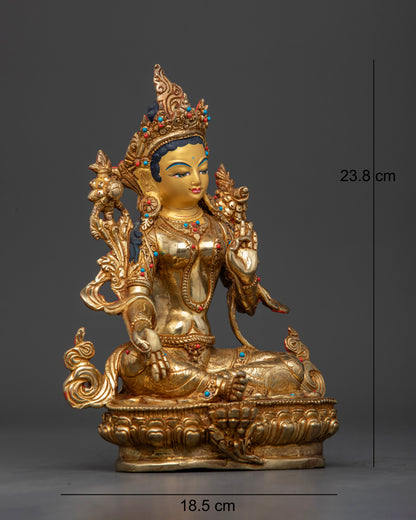 side view Green Tara statue right leg extended meditative pose copper gold gilded semi precious stones Nepal