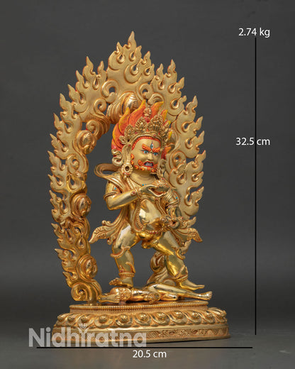 Side view of Black Dzambhala holding mongoose skull cup, traditional sculpture from Nepal