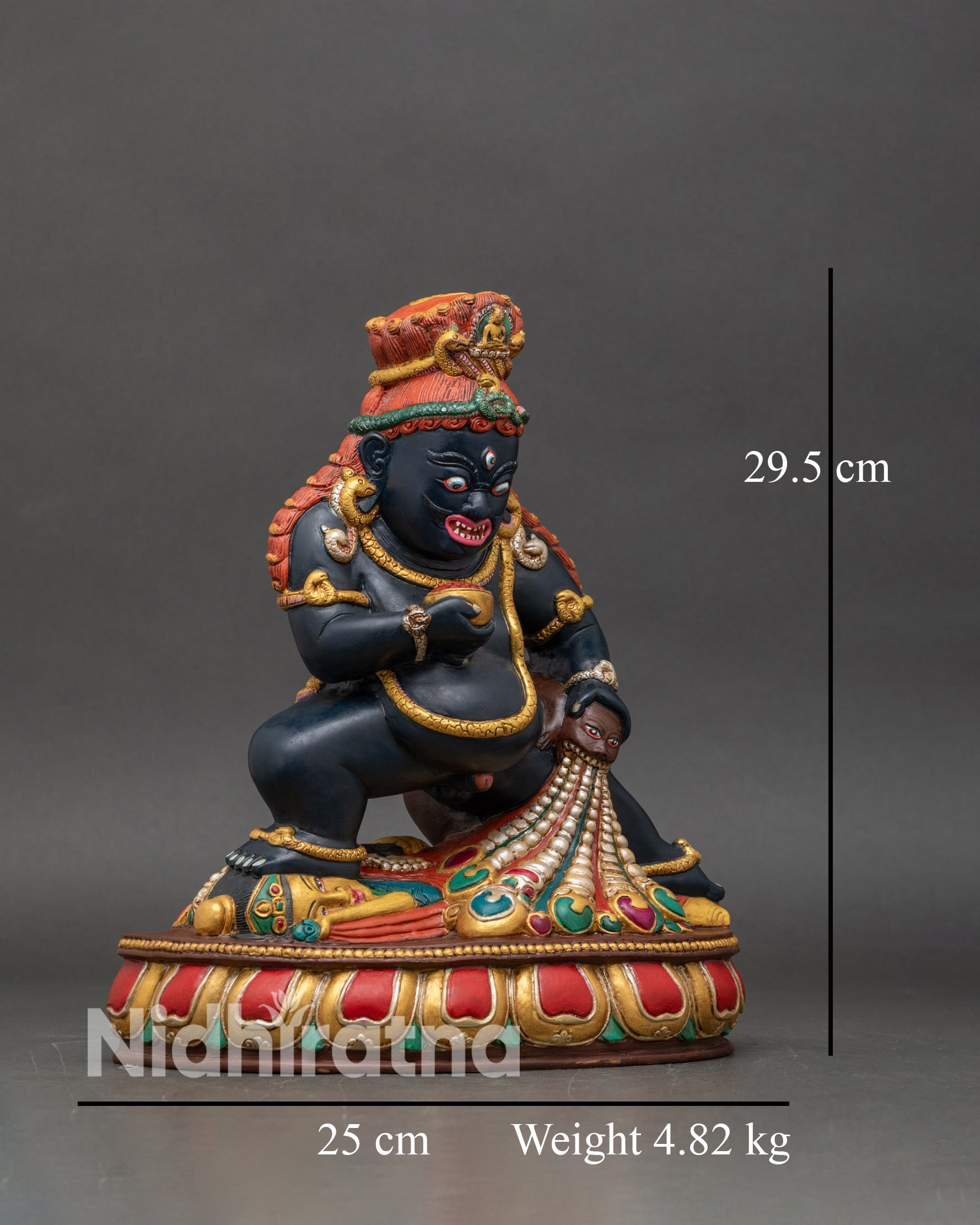 Side view Black Dzambhala statue lotus base subdued figure ornaments handcrafted
