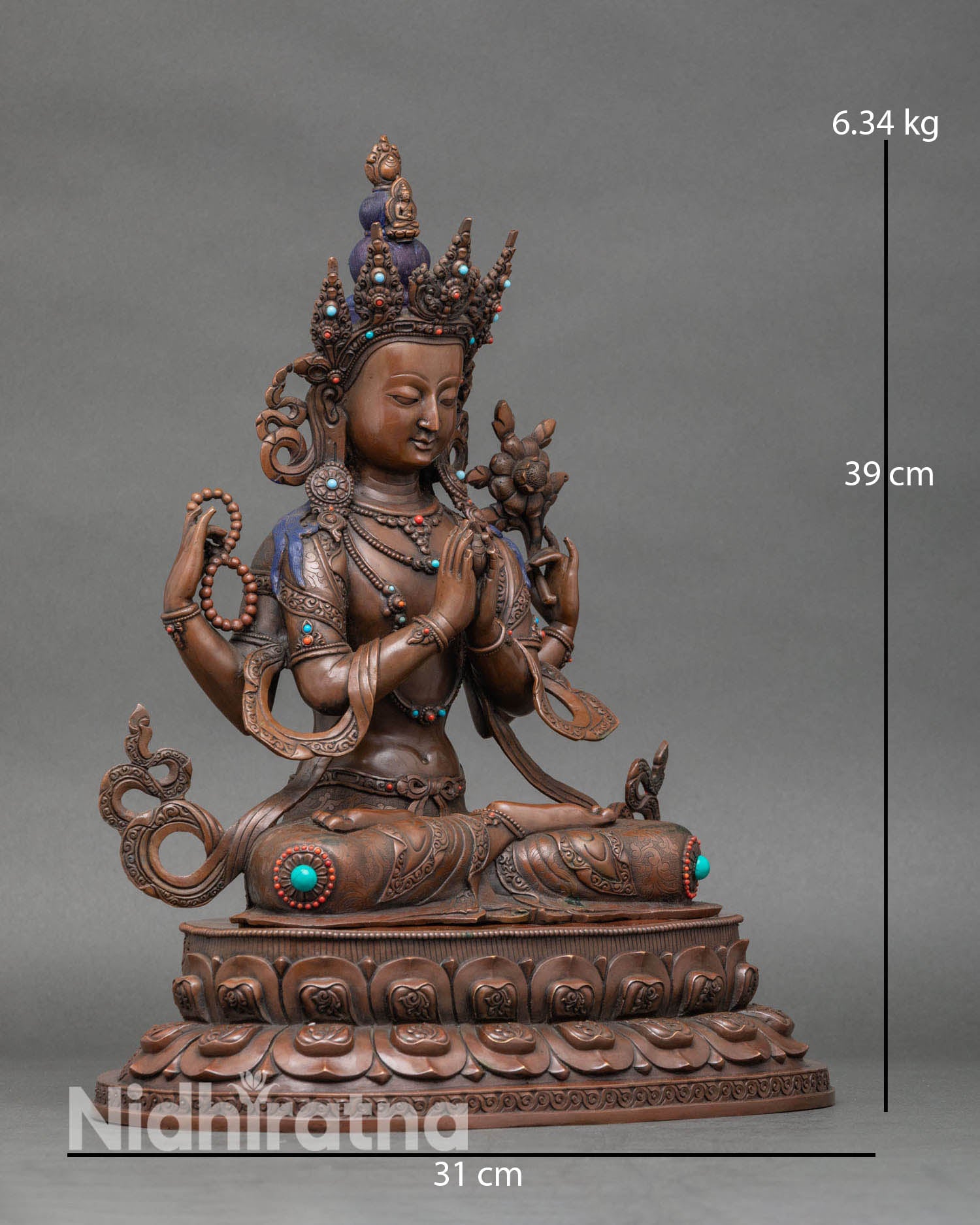 Side view of four arm Chenrezig Avalokiteshvara oxidized copper lotus seat