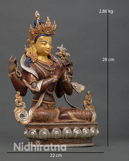 Side view of Chenrezig statue, four arms symbolizing compassion and wisdom copper metal finish with intricate Himalayan artisan detailing meditation art