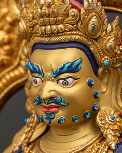 Side view close up of Namtoshe Vaishravana face with turquoise beard dots, blue brows and flame crown